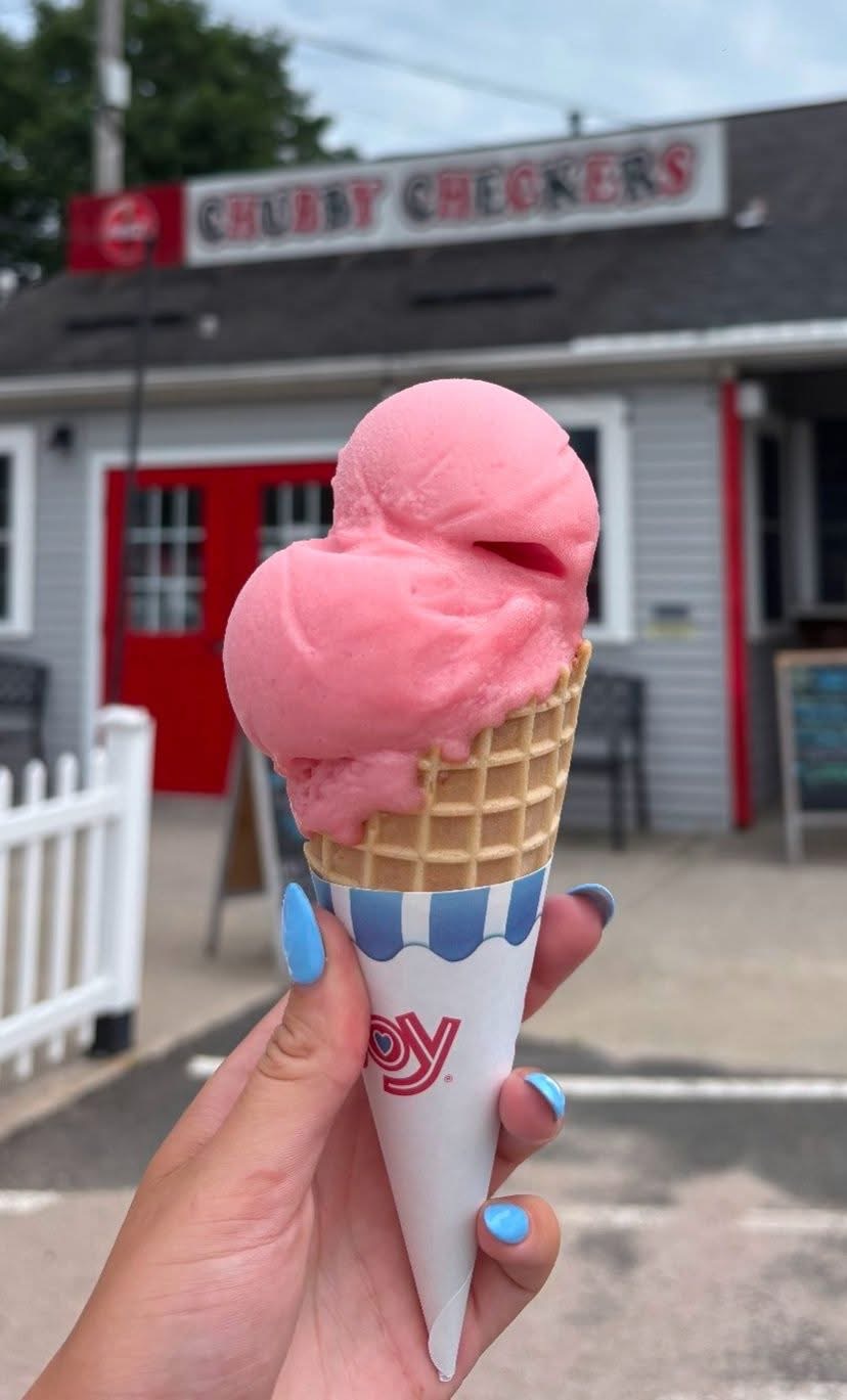 Double scoop of pink ice cream outside Chubby Checkers