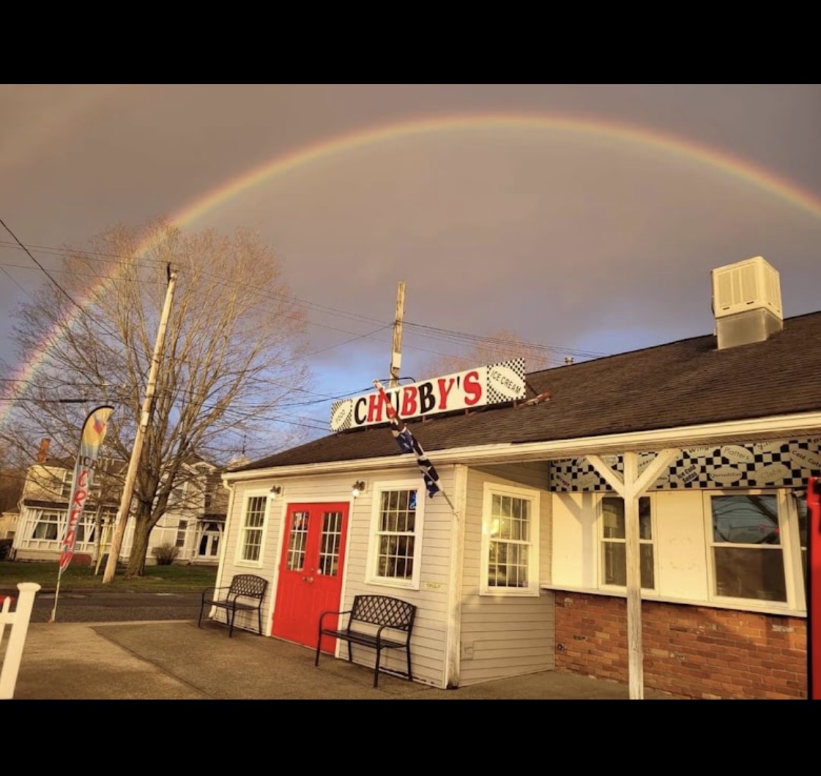 Chubby's restaurant in Belchertown, MA with a rainbow overhead