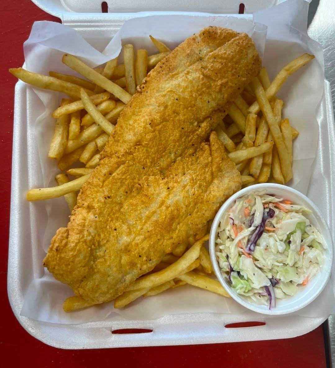 Fried fish and chips with coleslaw from Chubby's